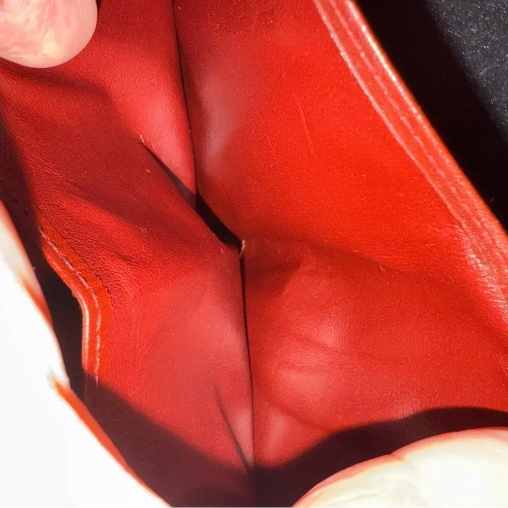 Never used Cartier red burgundy wallet comes with original box